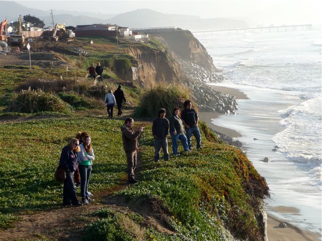 Spectators on the bluff
